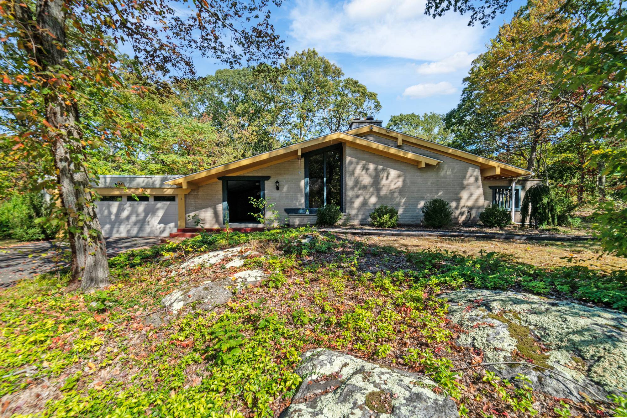 Step inside this striking contemporary ranch offering a layout unlike any other !