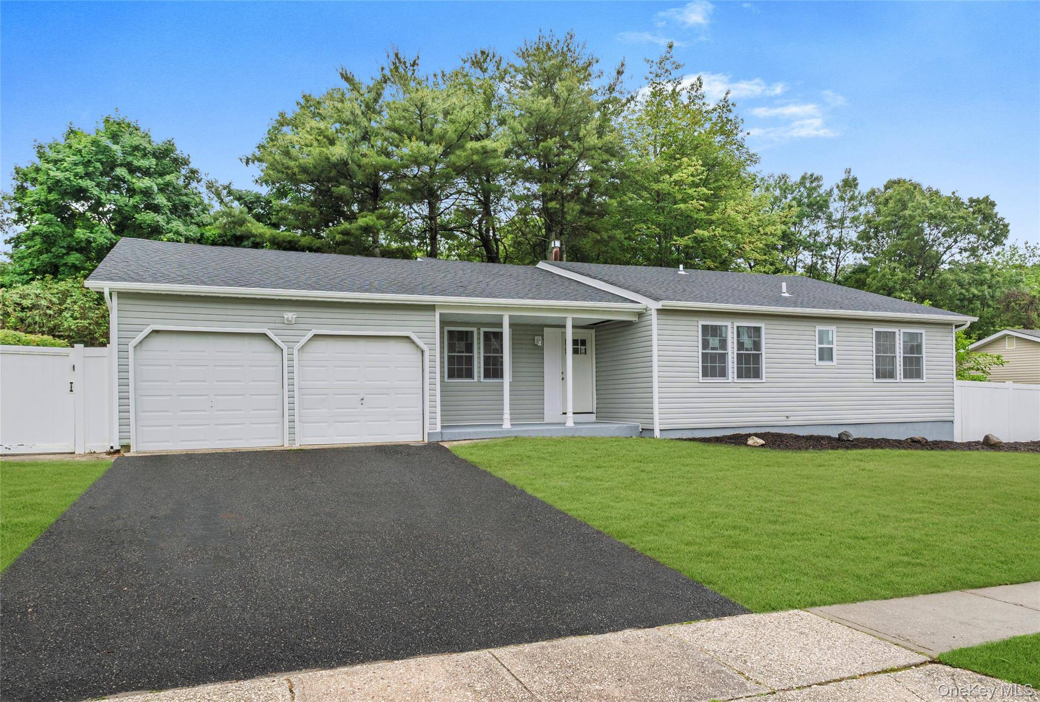 Welcome to this huge, fully renovated expanded ranch in the award winning Half Hollow Hills School District !