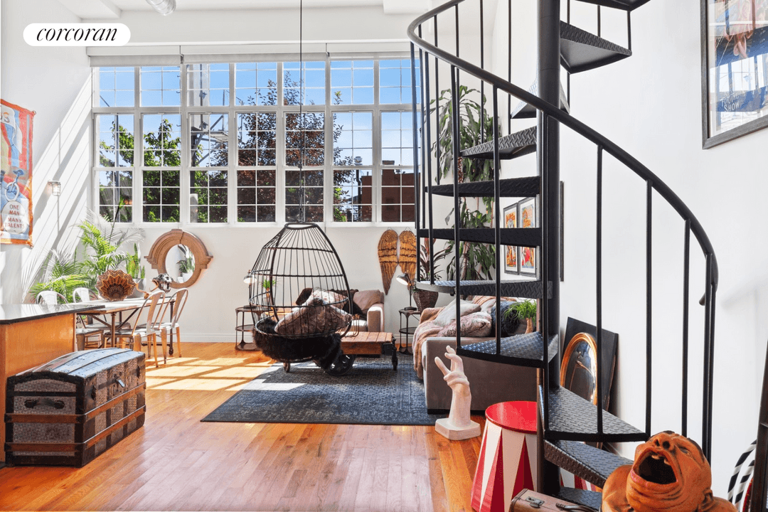 The beauty of these ground floor lofts at the Chocolate Factory is their 17' ceilings allowing for FULL HEIGHT rooms both above and below the loft space.