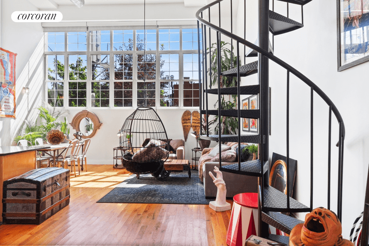 The beauty of these ground floor lofts at the Chocolate Factory is their 17' ceilings allowing for FULL HEIGHT rooms both above and below the loft space.