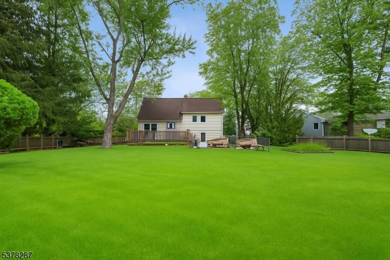 DESIRABLE, describes this immaculate split level home, newer oak kitchen and appliances, baths are updated, newer Anderson windows, bay windows front and back, hardwoodfloors and under, newer carpeting.