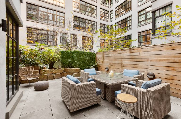 51 Jay Street, Residence 1K is a duplex loft with a private outdoor patio in a beautifully converted warehouse, designed by the acclaimed architecture firm, ODA.