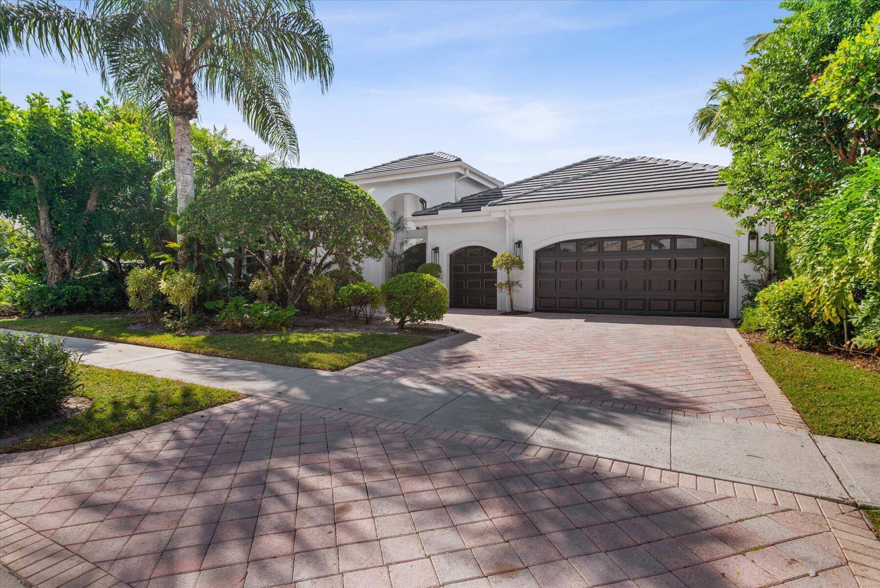 Beautifully furnished 3 bedroom, 3 bath single family home with a detached 1 bedroom, 1 bath guest cottage overlooking a private courtyard pool.