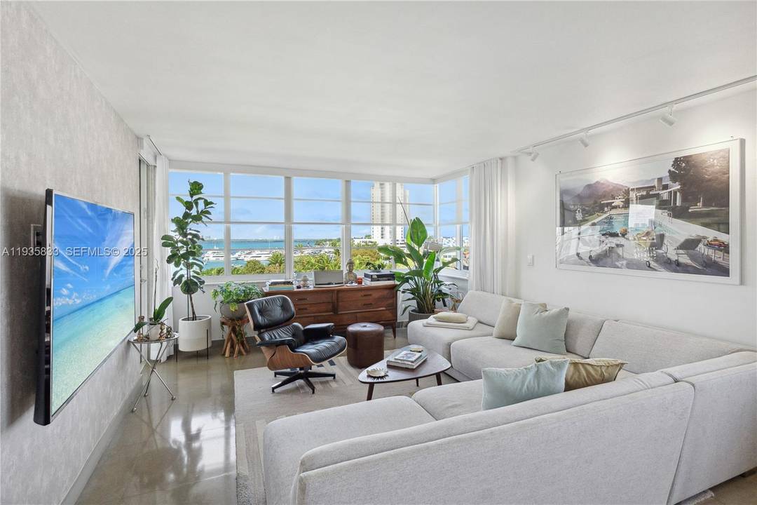 Discover this stunning top floor designer unit in a boutique waterfront building next to Sunset Harbour, nestled at the end of a quiet cul de sac near the Venetian Islands, ...
