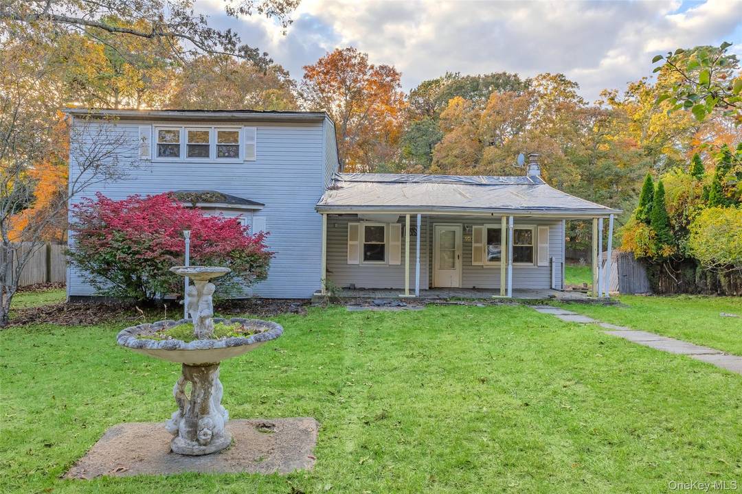 Opportunity Knocks in Middle Island Renovation Ready Colonial on Half Acre Lot !