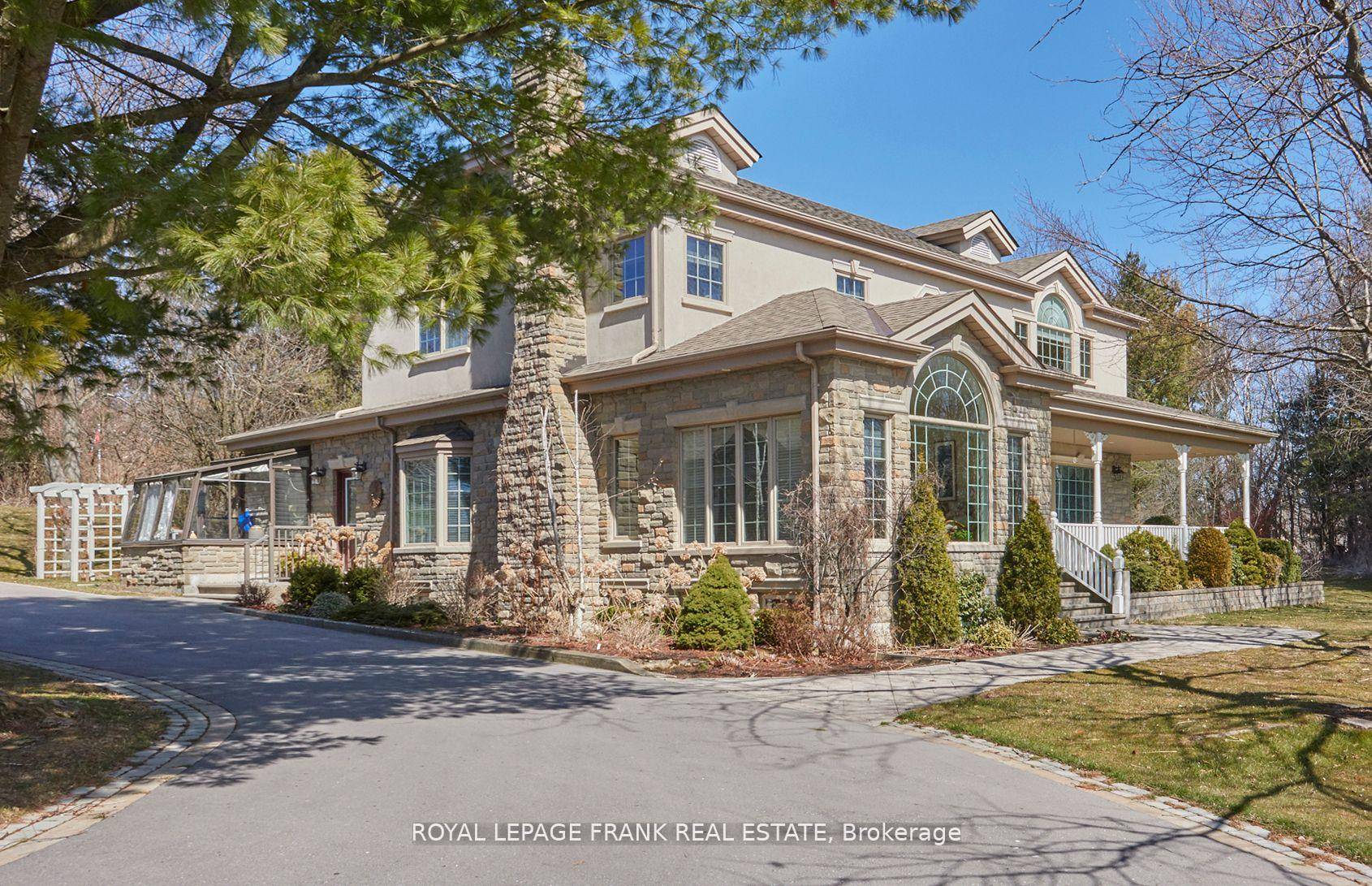 This home is located in the prestigious Oak Hills Golf and Country Estates.