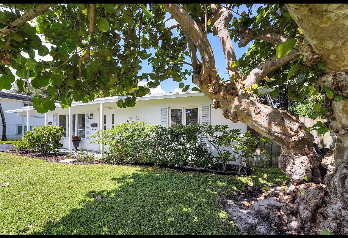 This charming East Boca Raton home is located just 3 blocks from top ranked Addison Mizner K 8 school.
