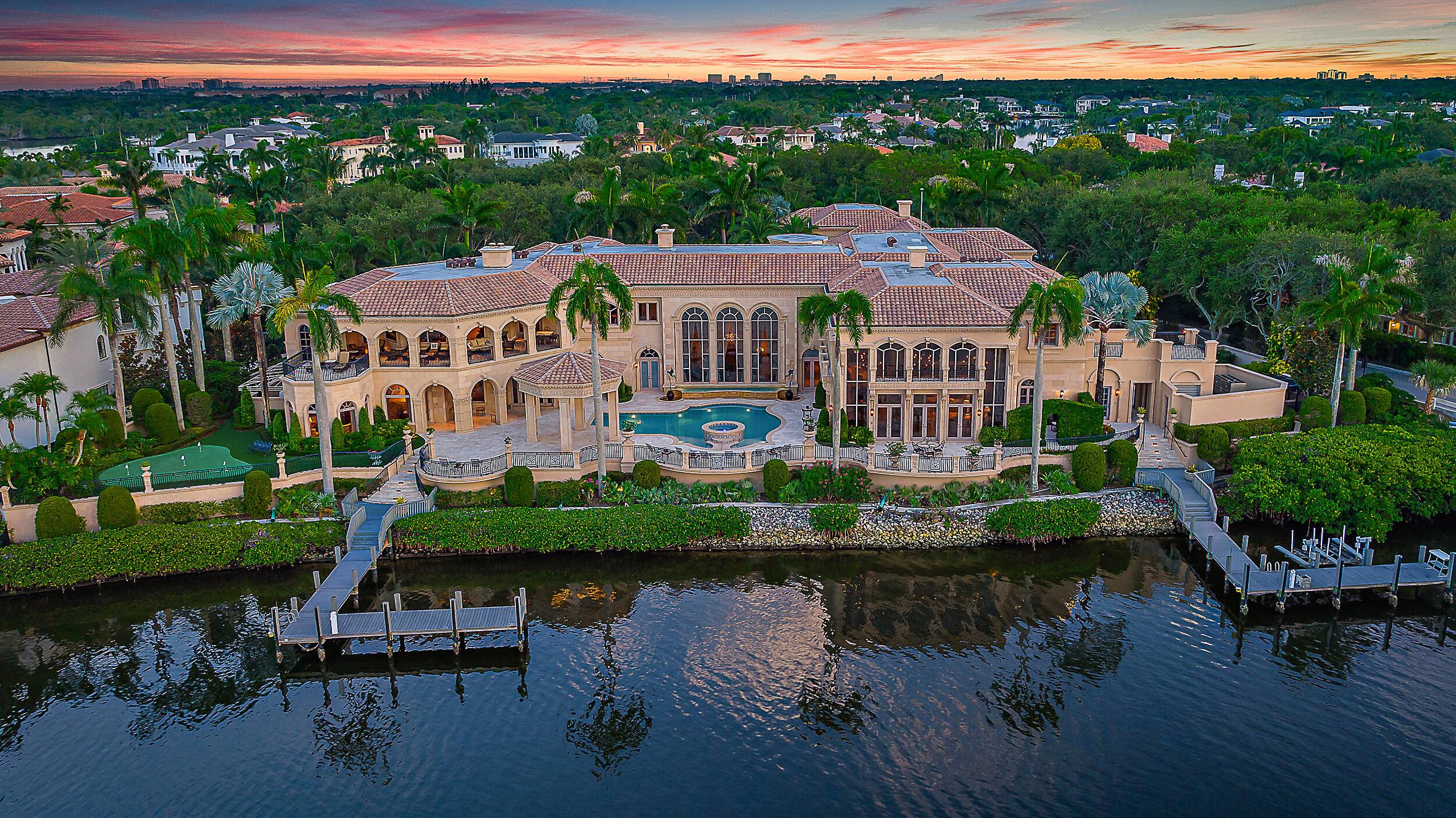 Introducing a palatial waterfront estate on a double lot in the exclusive community of Admirals Cove, where timeless design meets South Florida luxury.