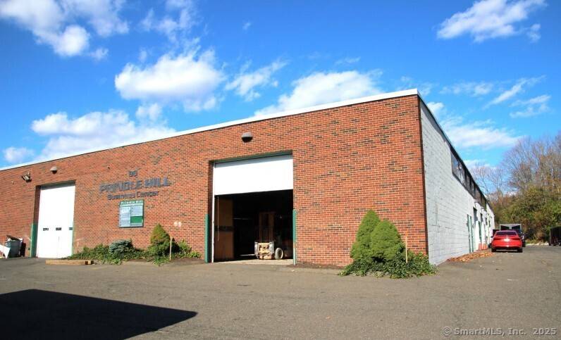 Exceptional 3, 860 SF Woodworking and Custom Cabinet Facility for sale.