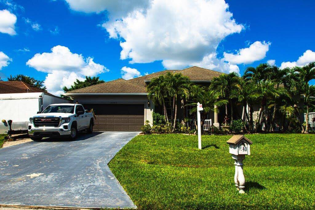 This amazing single family home sits on a quiet street of Port St Lucie neighborhood, just a couple blocks from shopping, dining, parks, churches also with an easy commute to ...