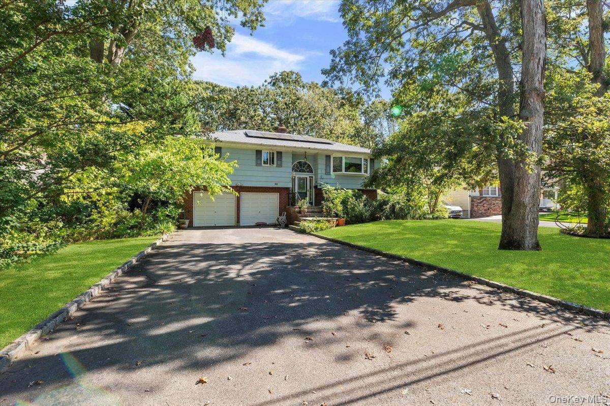 Charming High Ranch in West Islip 3 Bedrooms, 2 Full Baths, with Spacious Deck Welcome to 69 Horton Street, a delightful High Ranch split entry home perfectly situated on a ...