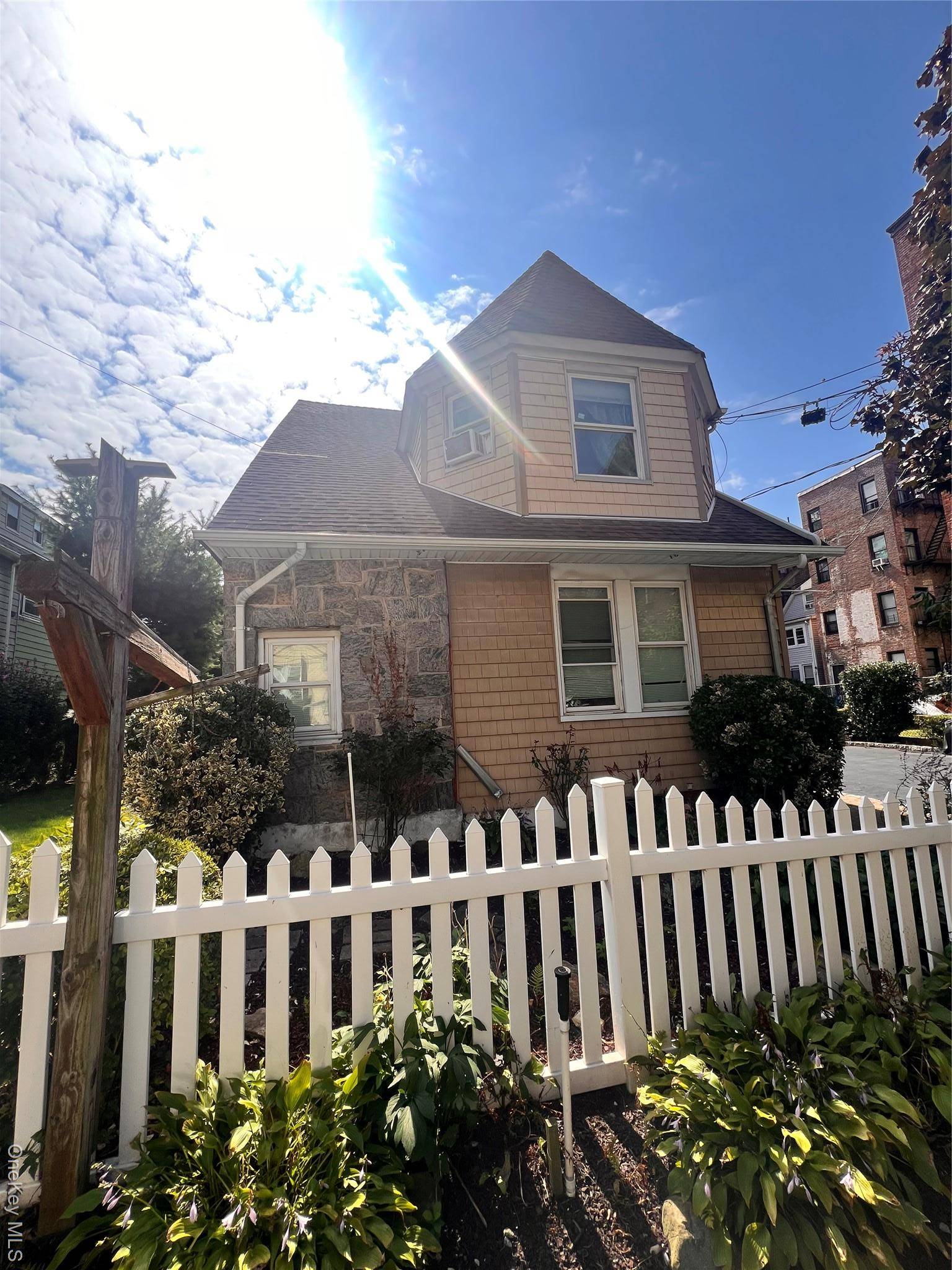 Beautiful first floor apartment with 3 4 spacious bedrooms and backyard access.