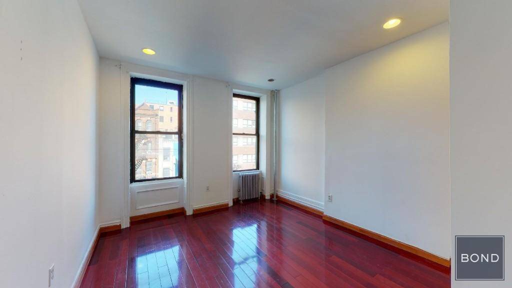 Loft style 2 bedroom apartment with a home office, very large living room, high ceilings, beautiful hardwood floors, two queen size bedrooms and one smaller bedroom, nice appliance and granite ...