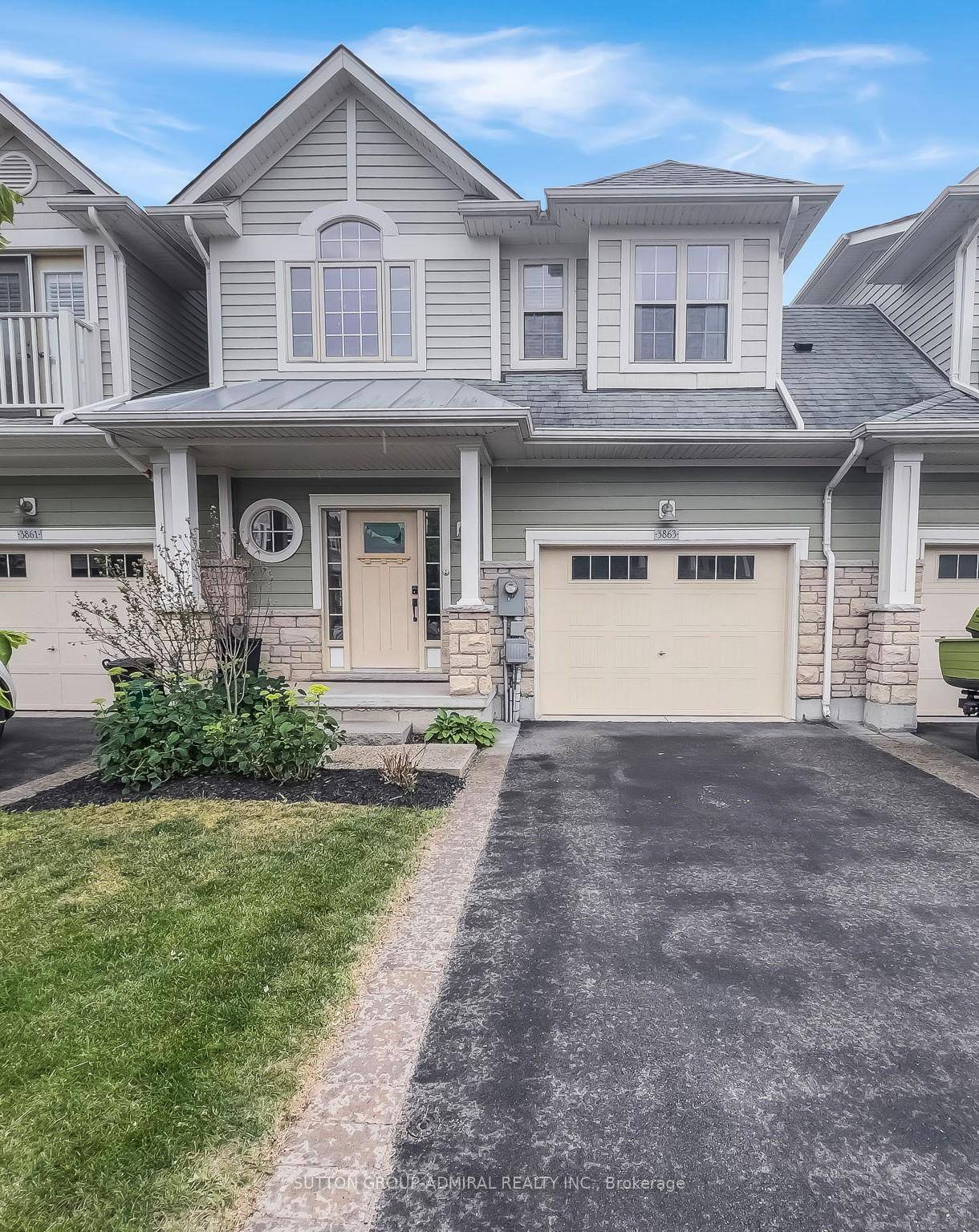 Rare Linked Townhome Located on a Quiet and Picturesque Street in Crystal Beach.
