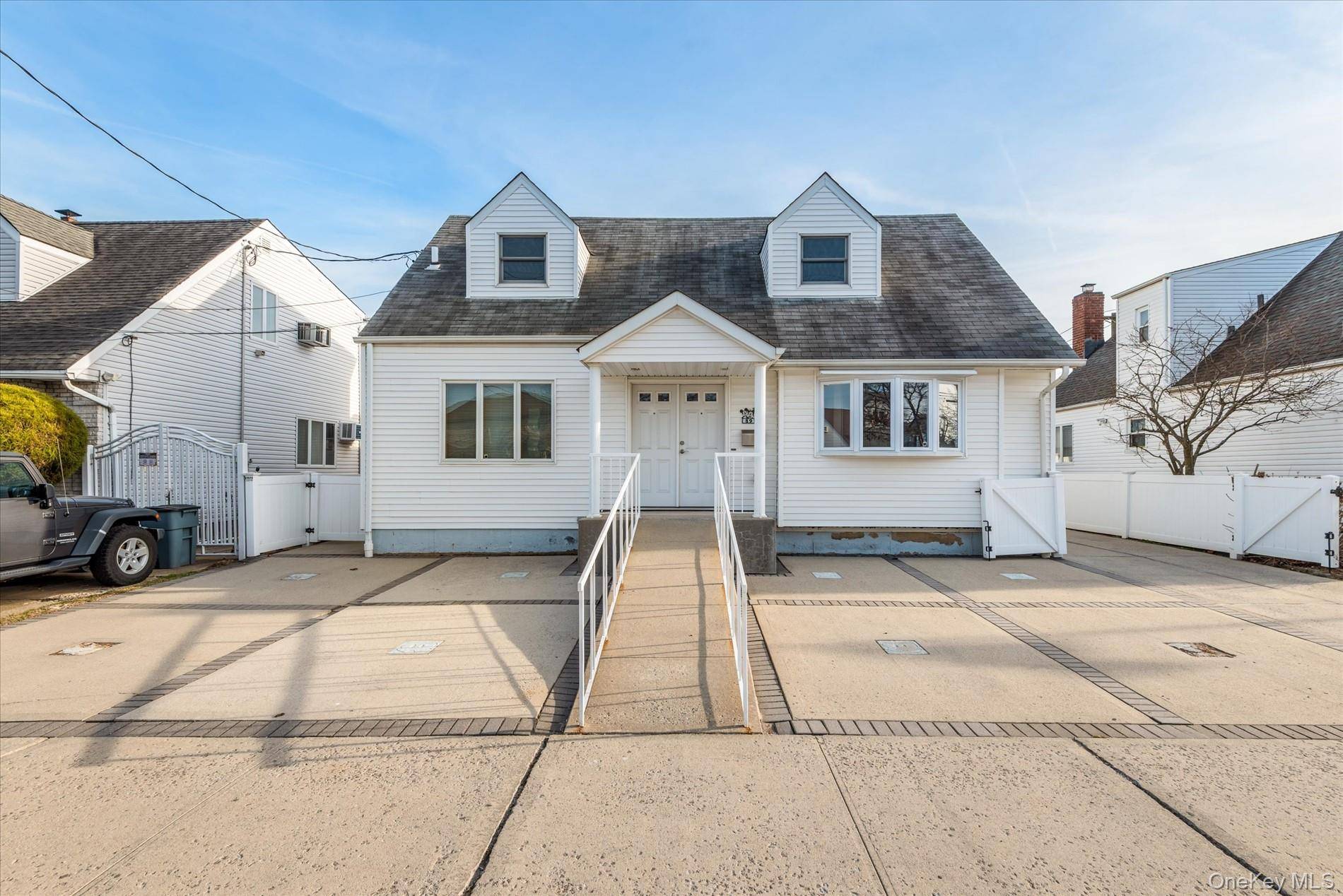 Welcome to this beautifully maintained 1 family Cape in the heart of Howard Beach !