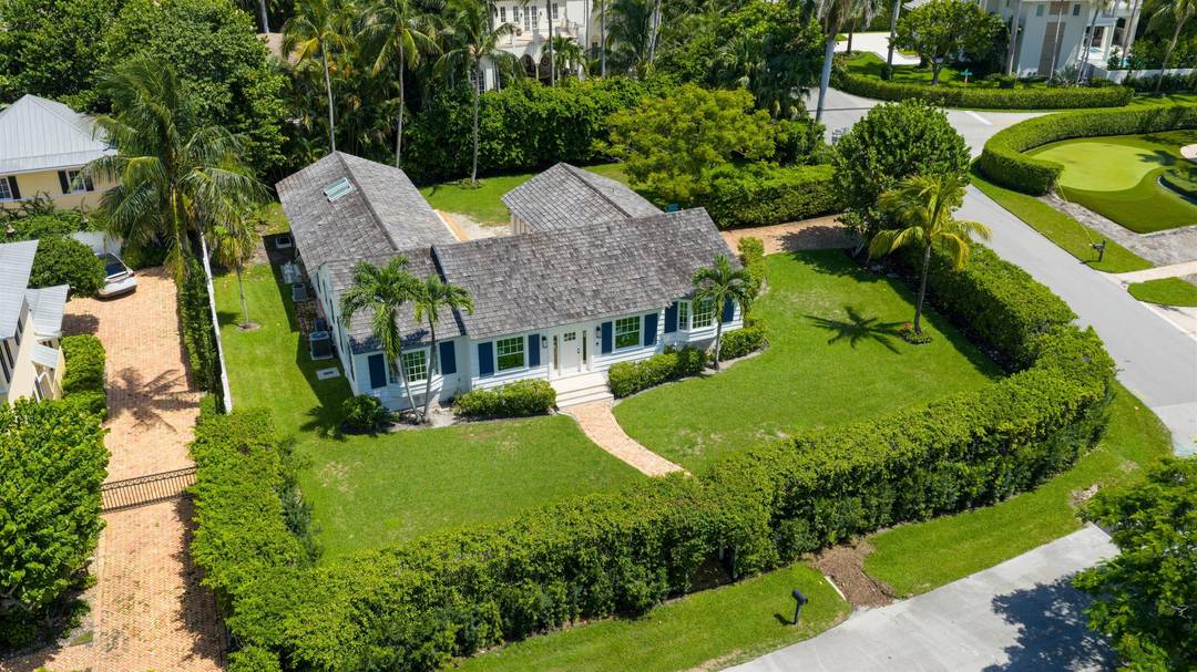 Just one block from the beach and a short stroll to Atlantic Avenue, this one of a kind residence sits on one of the most private and expansive corner lots ...