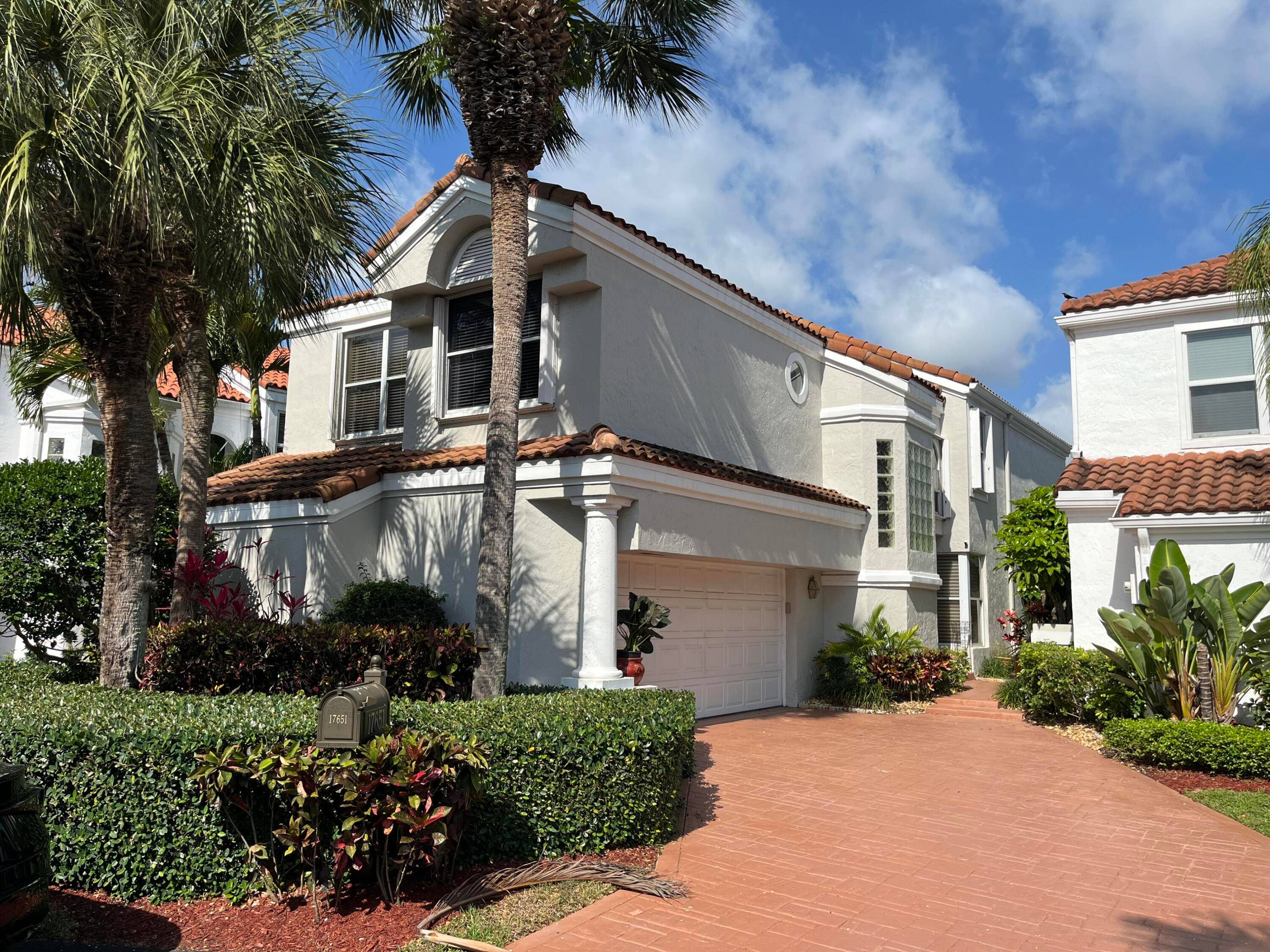 Welcome to this beautiful home, located in the gated community of Boca Country Club non mandatory membership, this gem sits on the 18th hole with breathtaking views.