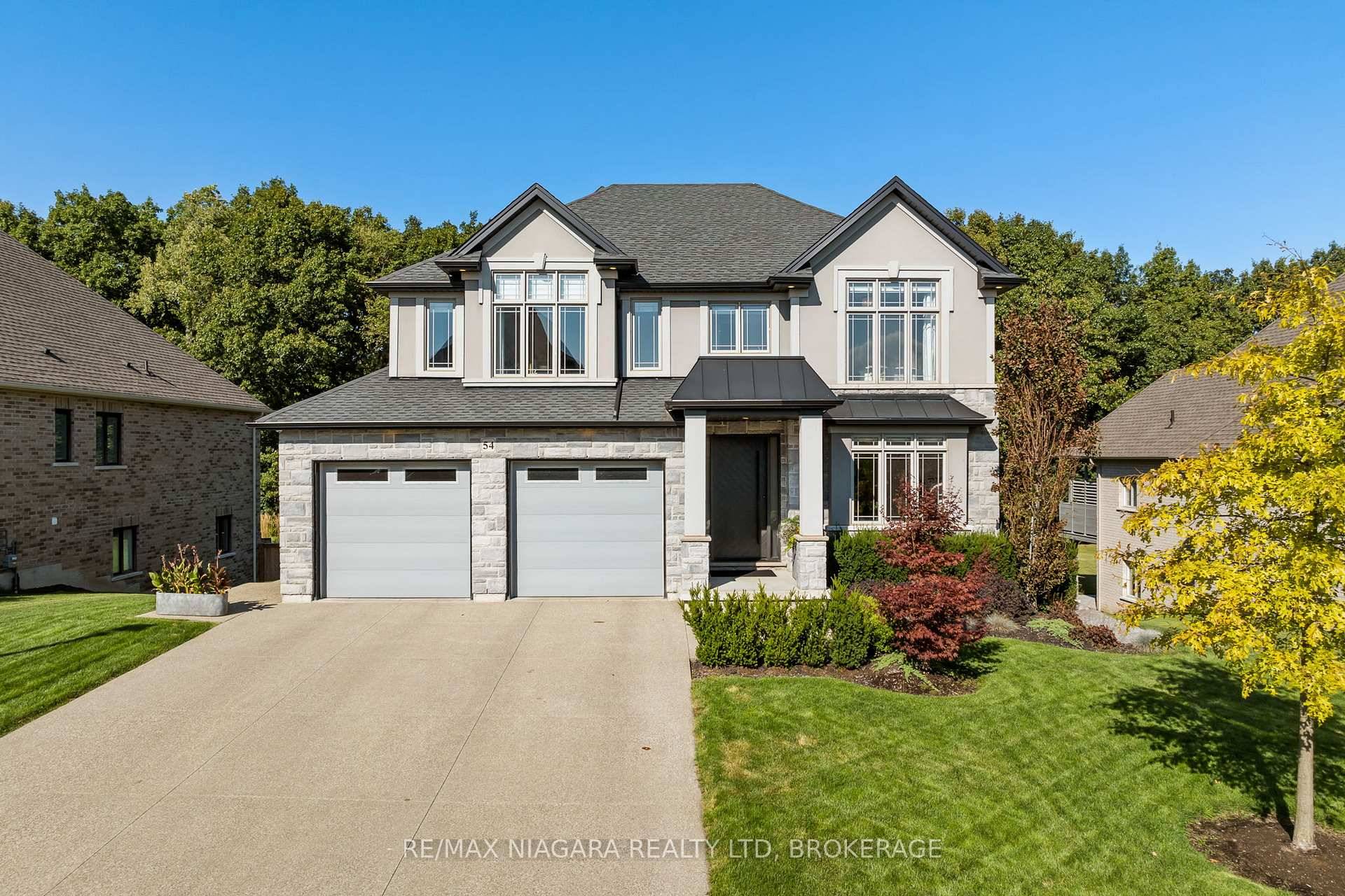 Perched atop the escarpment, this stunning custom built two storey home offers generous finished living space, featuring four spacious bedrooms, four bathrooms, an oversized double car garage, a walkout basement, ...