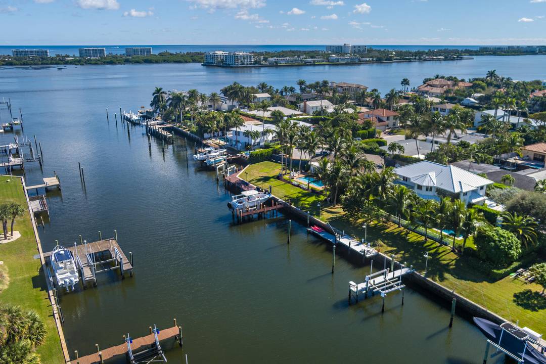 This stunning waterfront property in Lake Worth offers the perfect blend of luxury, privacy, and functionality.