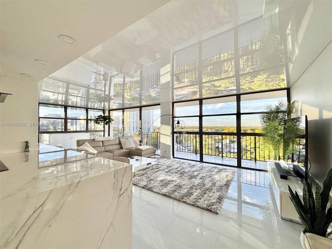 This is a WOW unit ! ! Stunning large corner unit condo on the Intracoastal with breathtaking southwest views and a sun drenched wraparound balcony perfect for enjoying spectacular sunsets.