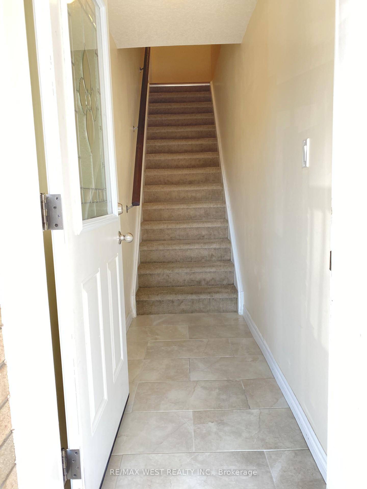 This Stacked Townhouse Offers A Beautiful Open Concept Living Room, Creating A Spacious And Inviting Feel.