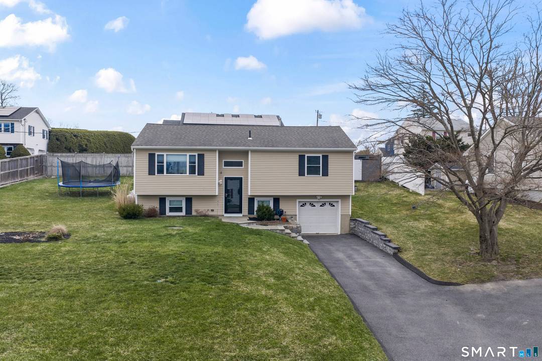 Welcome to 16 Curtis Ave in New Fairfield where comfort, style, and functionality come together in a beautifully updated raised ranch.