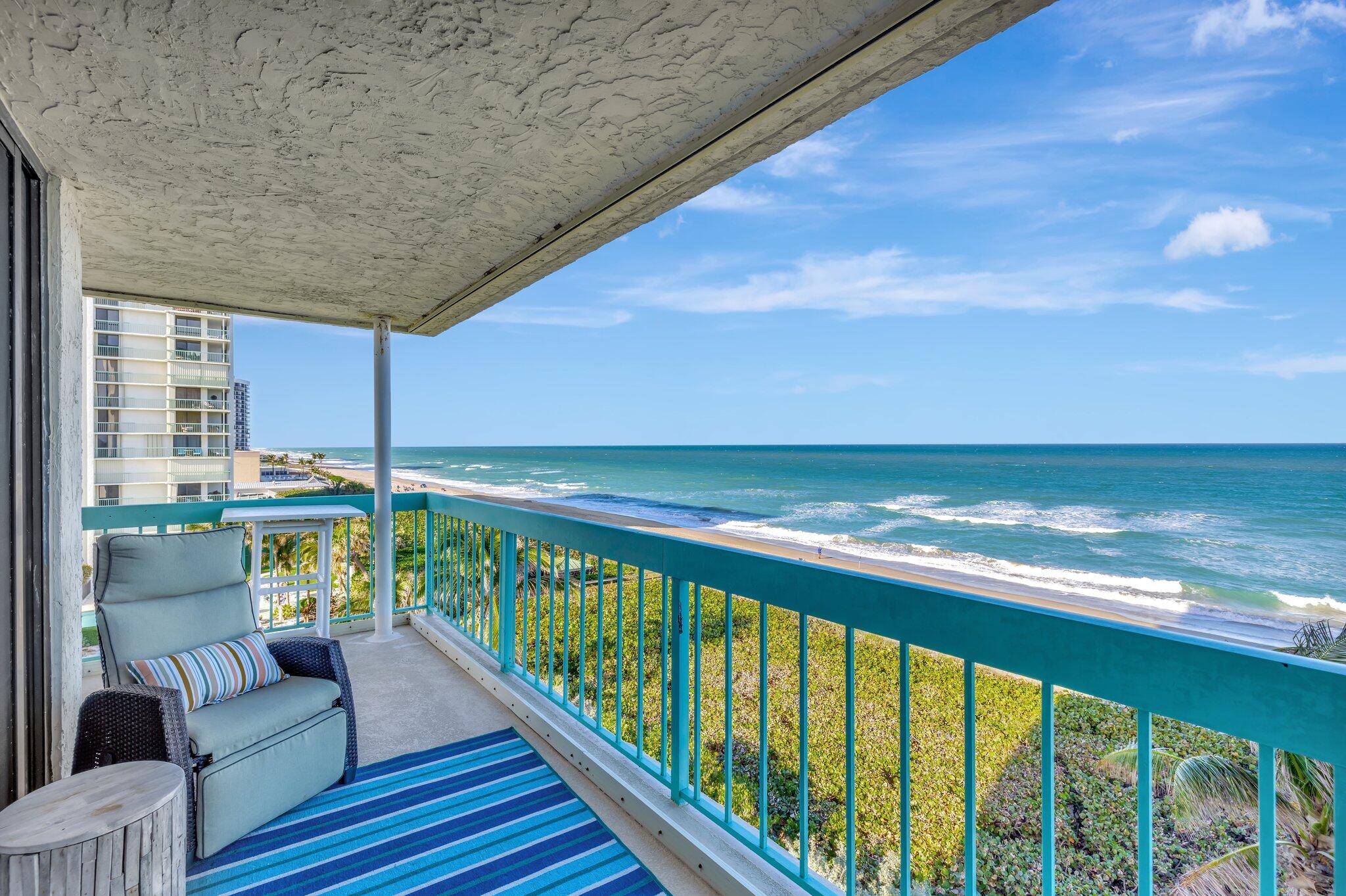 An idyllic oceanfront retreat with an extended wrap around balcony is stylishly furnished, ready for you to peacefully enjoy.