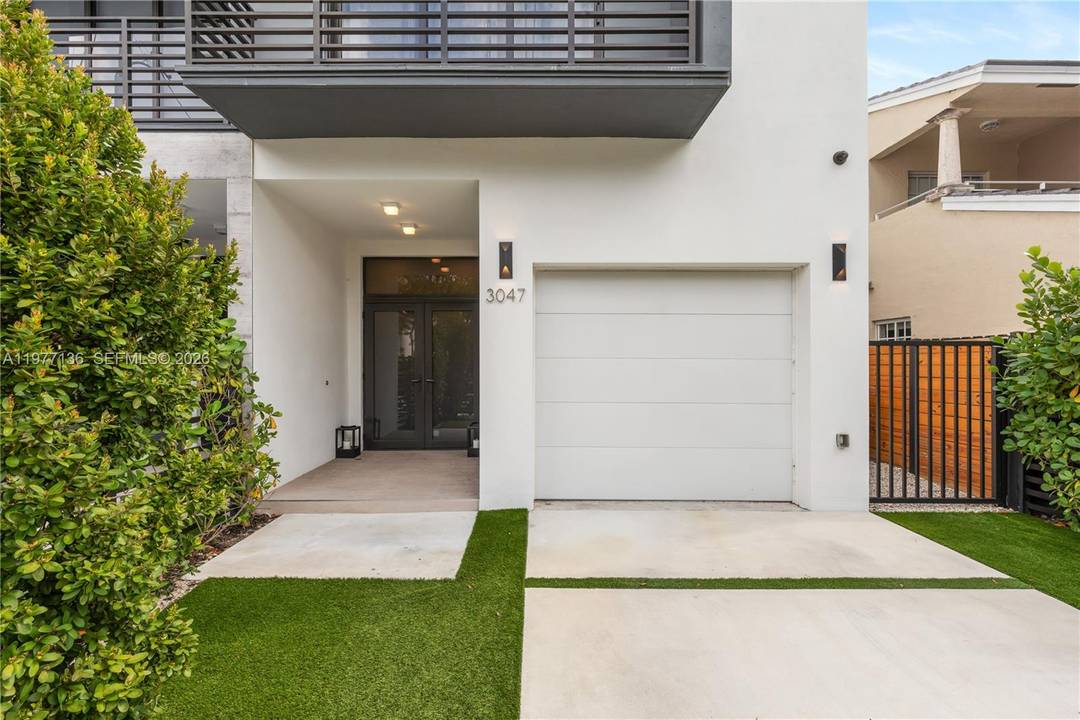Beautiful modern style townhouse in the heart of Coconut Grove featuring 4 bedrooms and 4.