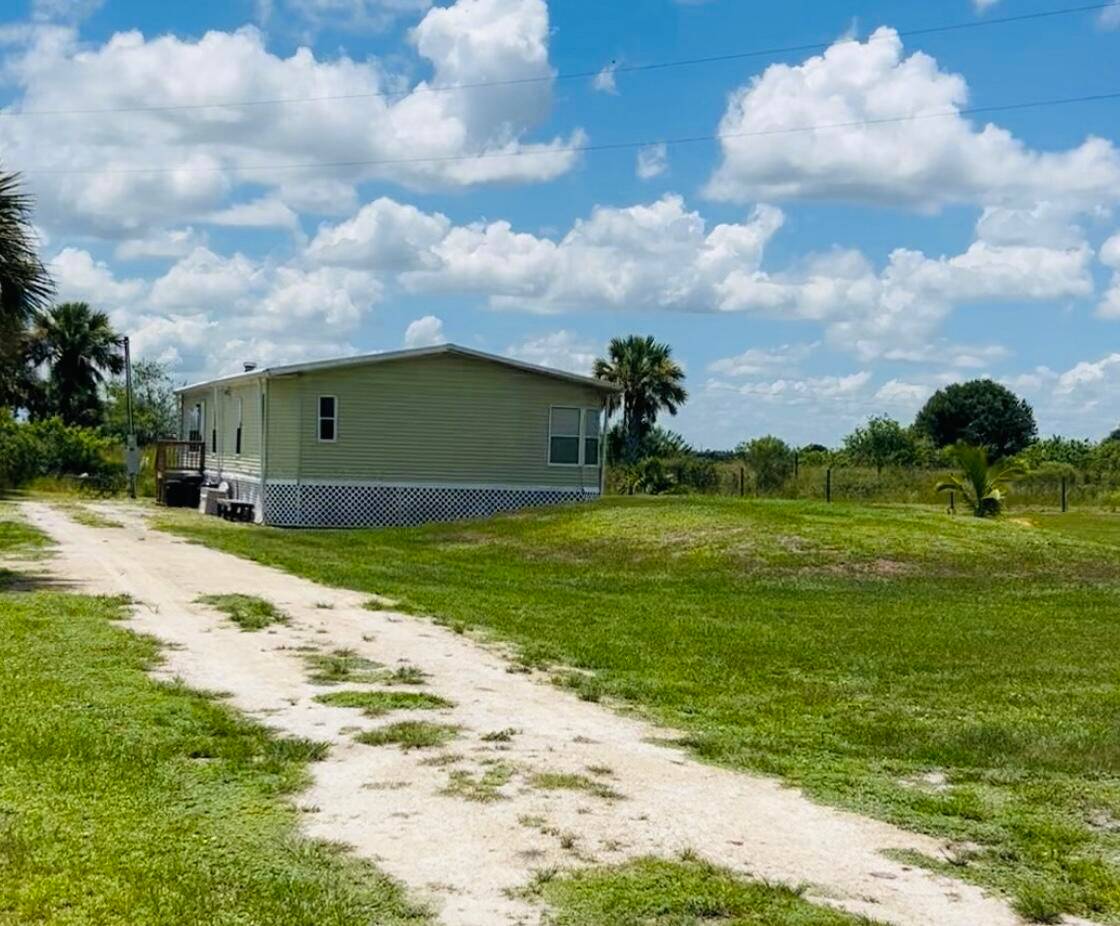 Cozy 3 Bed, 2 Bath Double Wide Mobile Home on over 1 AcreNestled in a serene, quiet community surrounded by farmland, this fully furnished mobile home offers the perfect blend ...