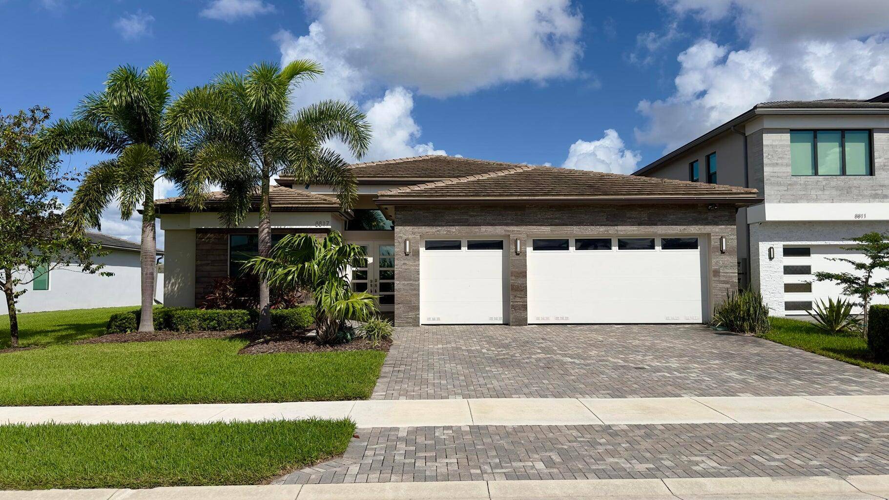 Experience luxury redefined in this stunning single story waterfront home in the prestigious Lotus community a true masterpiece with sophisticated upgrades !