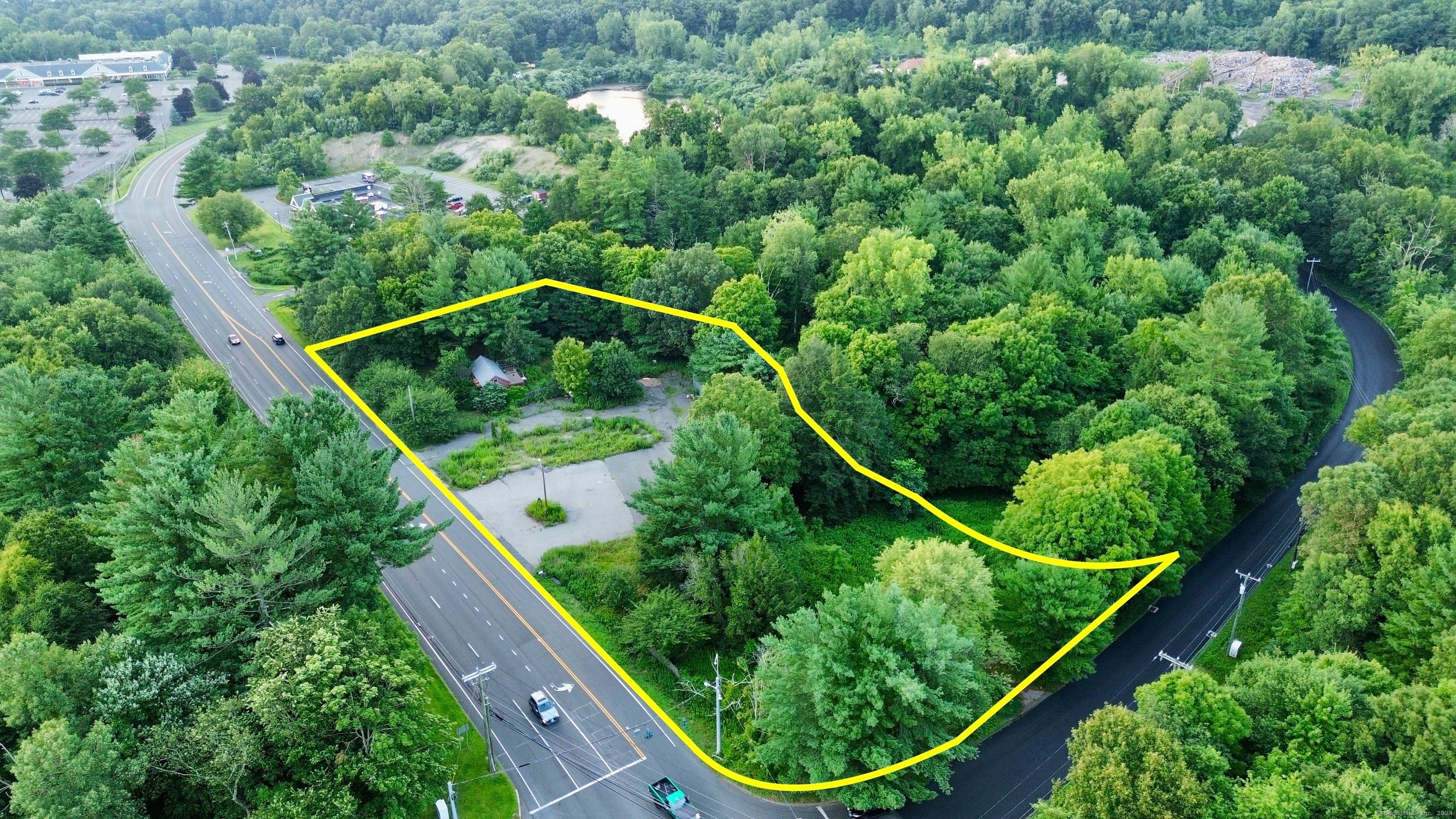 TWO adjacent commercial lots totaling 2.