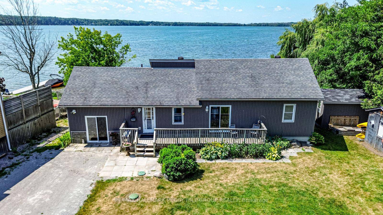 ESCAPE TO ORR LAKE FOUR SEASON FUN WITH 110 FT OF SHORELINE, A DOCK amp ; MULTIPLE OUTBUILDINGS !
