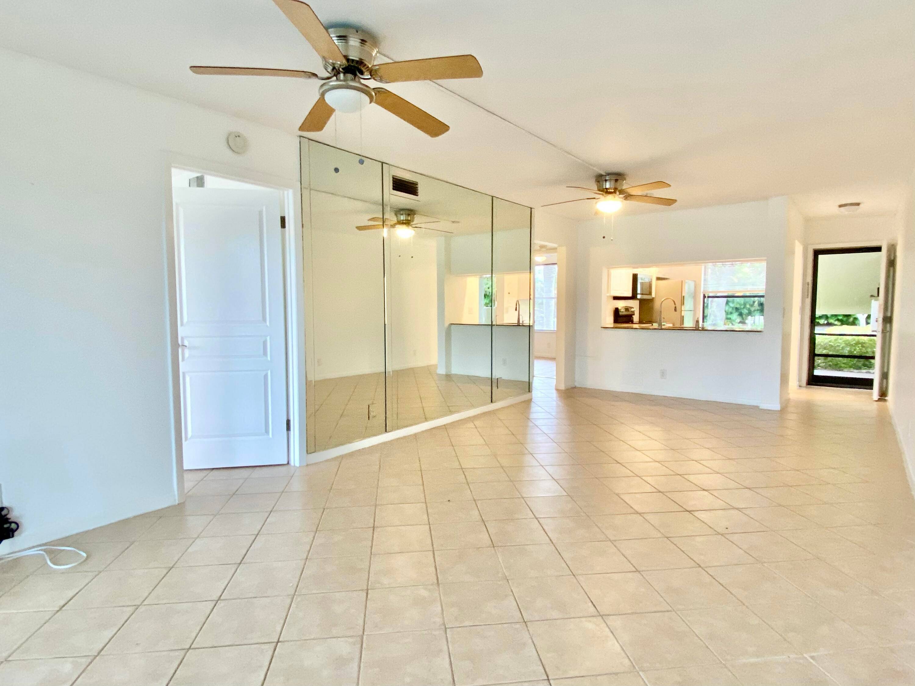 Beautiful Ground Floor 2 bedroom 2 bathroom condo with a serene and picturesque lakeview.