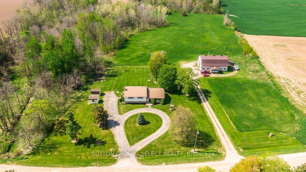 Welcome to this country charmer with just over 7 acres of land with a house, barn and 2 storage sheds.