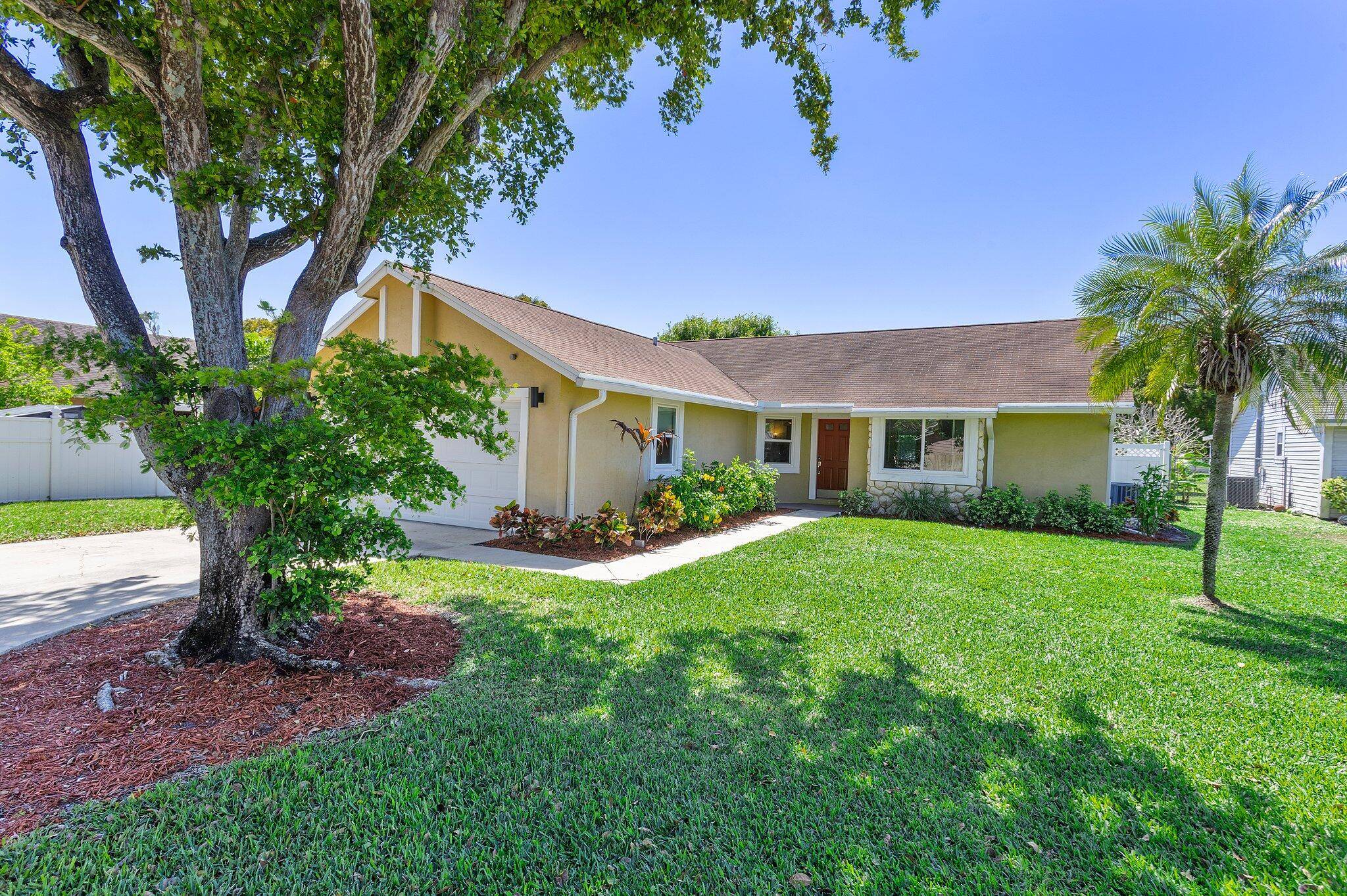 Unique beautiful home located in a cul de sac corner lot which is the largest lot in this quiet, yet convenient gated community of Stonehaven in Boynton Beach.