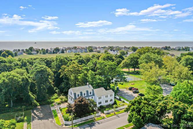 Extremely rare opportunity to own a side by side, Colonial style duplex with over 4400sqft in total and 10 bedrooms in the heart of the Fairfield beach area.