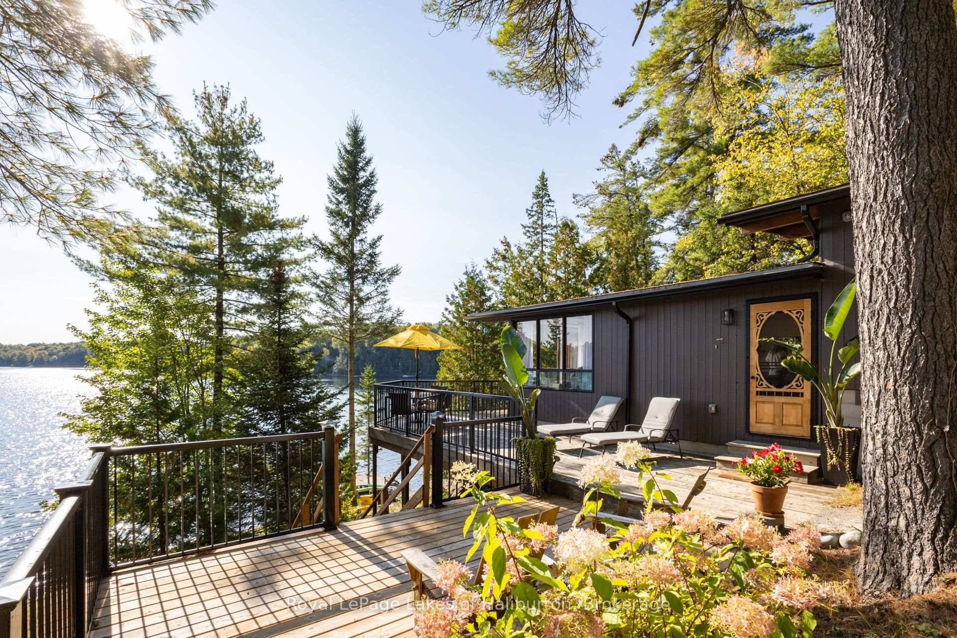Discover the exceptional tranquility of this pristine Crystal Lake hideaway.