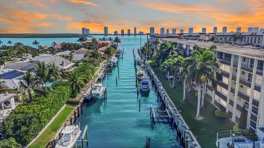 Embrace the ultimate coastal lifestyle in this fully furnished turnkey remodeled 2 bed 2 bath condo w breathtaking views of the Intracoastal marina complete with the availability to rent a ...