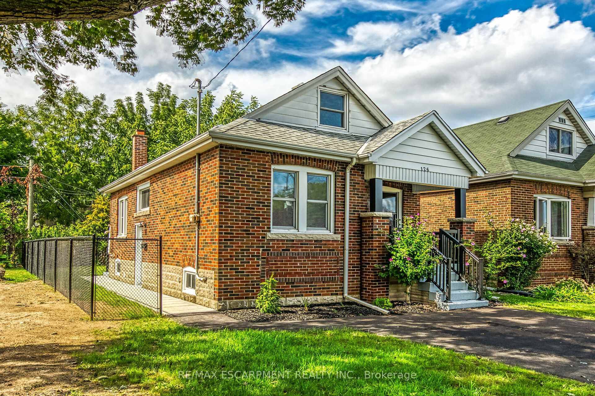 THIS ONE HAS IT ALL ! The home you've been waiting for featuring a FULL IN LAW SUITE with private side door entry !