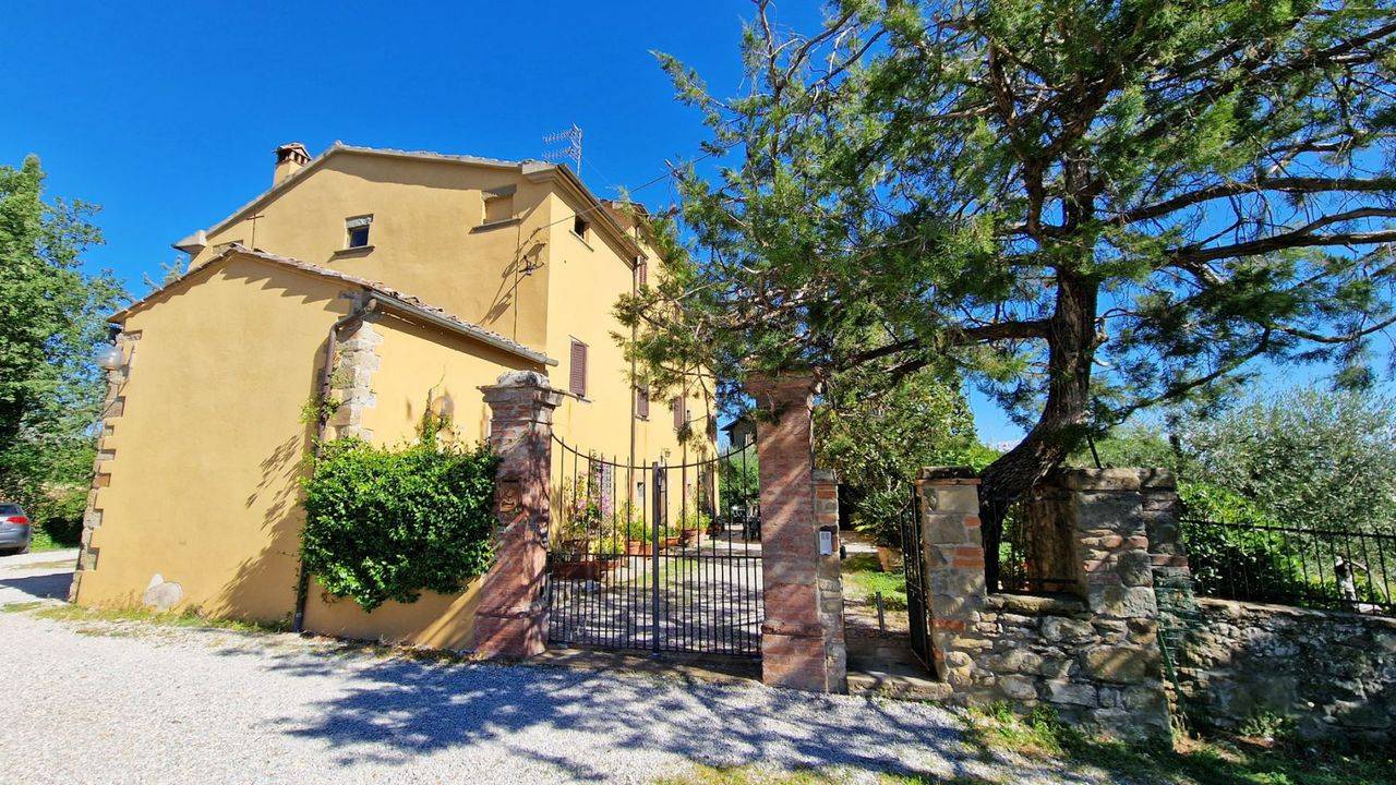 Near the center of the Tuscan village of Monte San Savino, a historic villa with garden, lemon house, garage and chapel is for sale