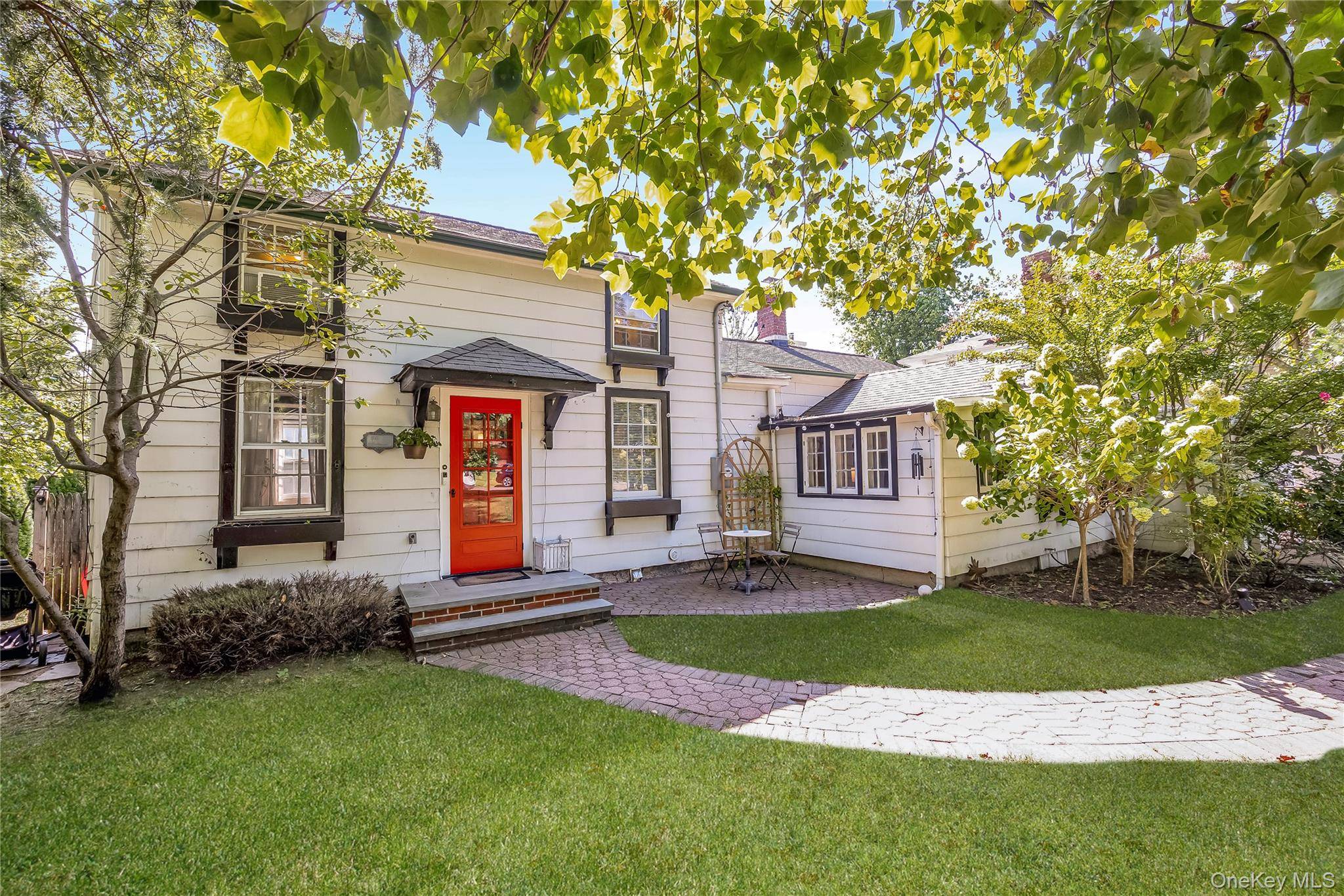 Enter through the charming Red Front door of 16 Rider Ave, Malverne, and you ll instantly feel at home.