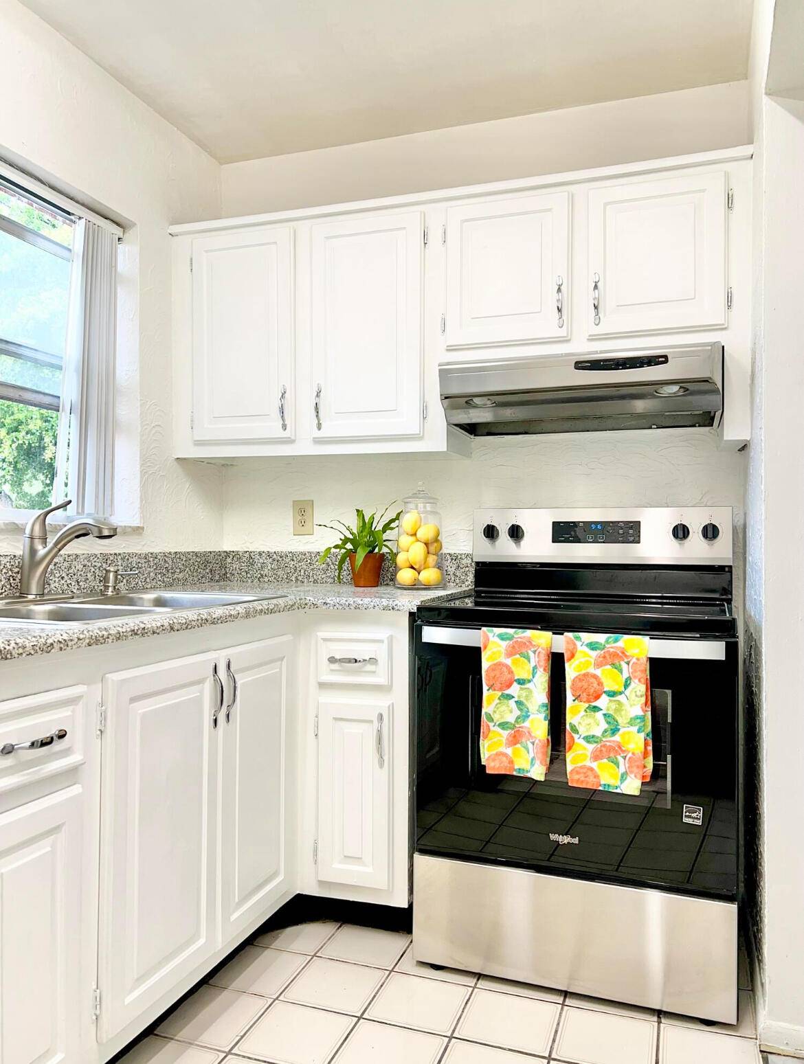 Sweet and cozy, second floor, corner unit tucked away in beautiful Golden Lakes Village.