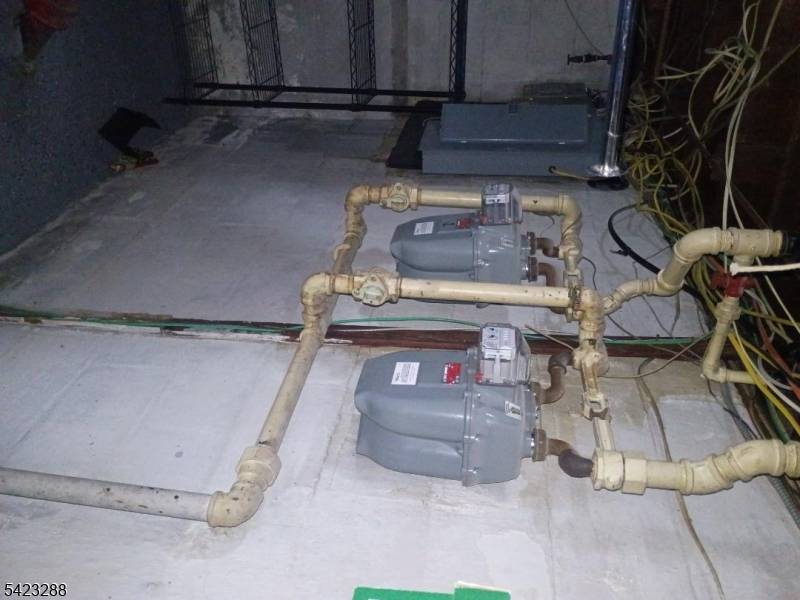 Adorable 2 family house located on a corner lot with a tree lined, low traffic street in an unbeatable location.