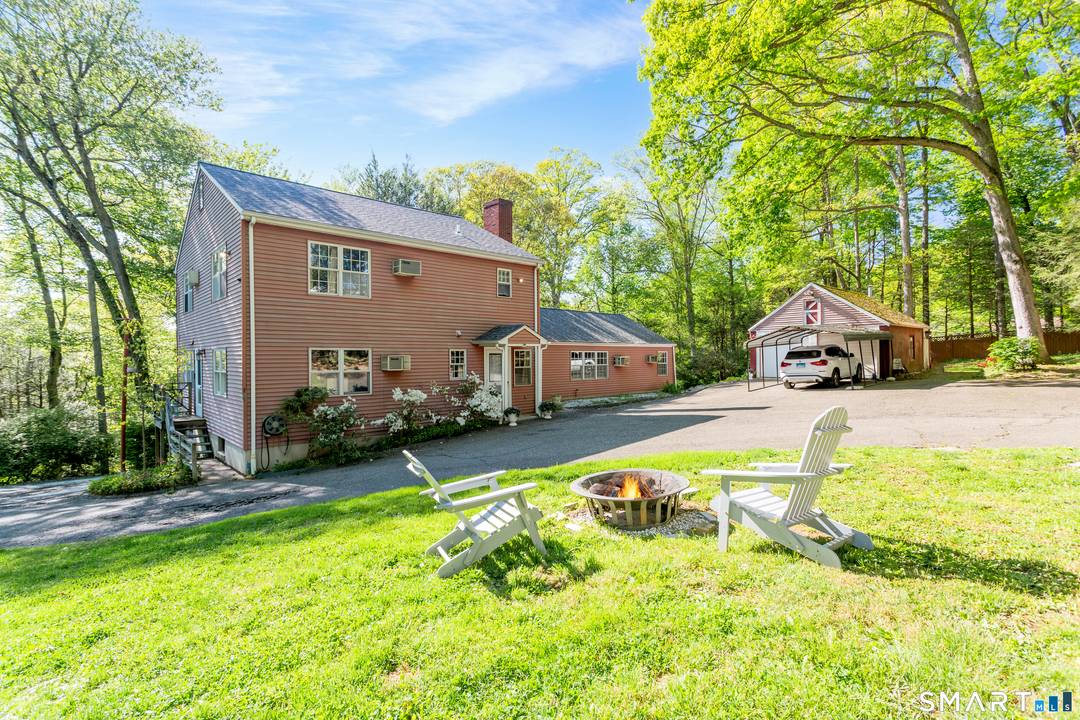 Spacious Colonial set on a serene and private 1.