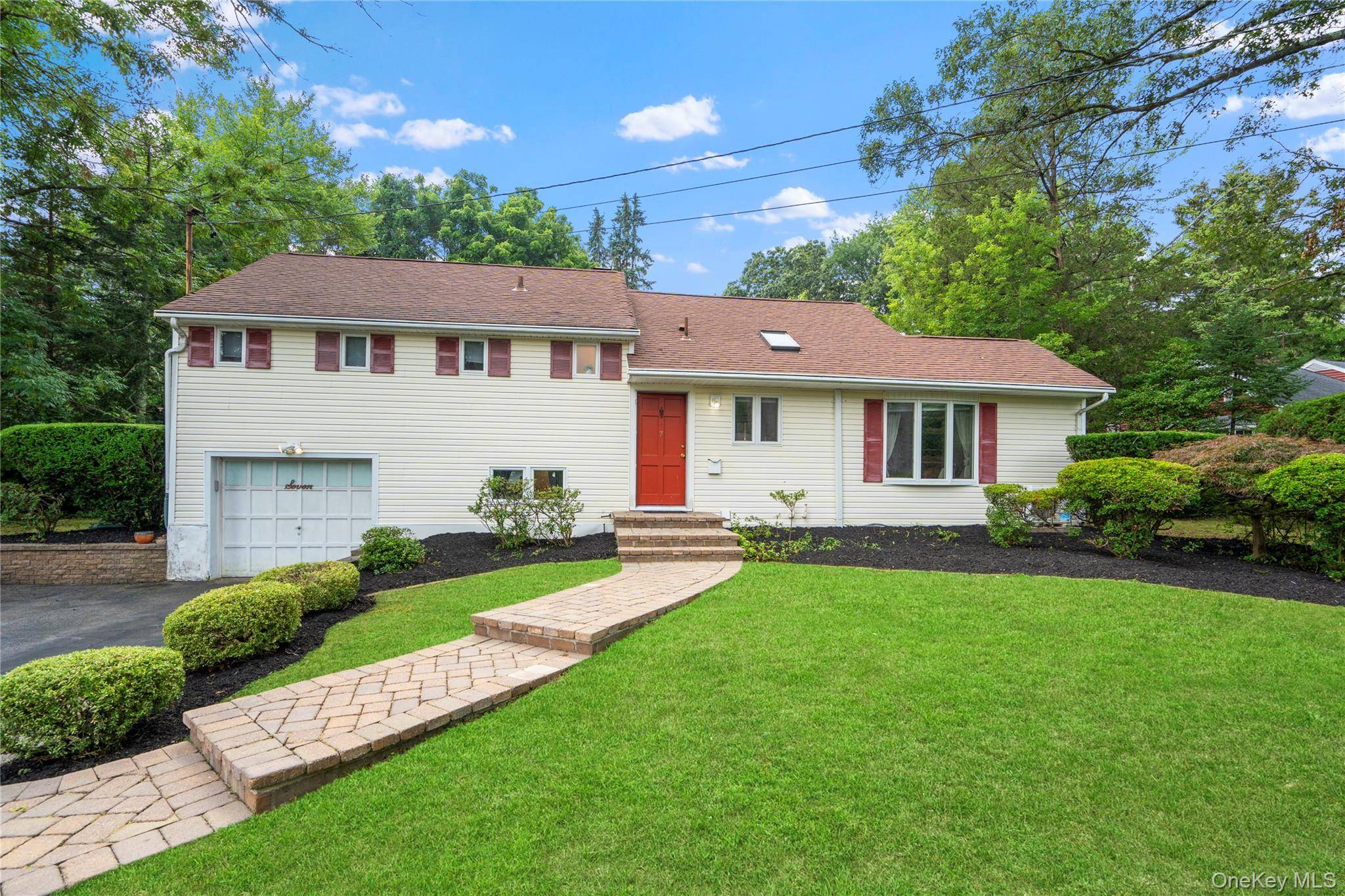 Welcome to this beautifully updated Split Level home in the desirable Rolling Woods neighborhood.
