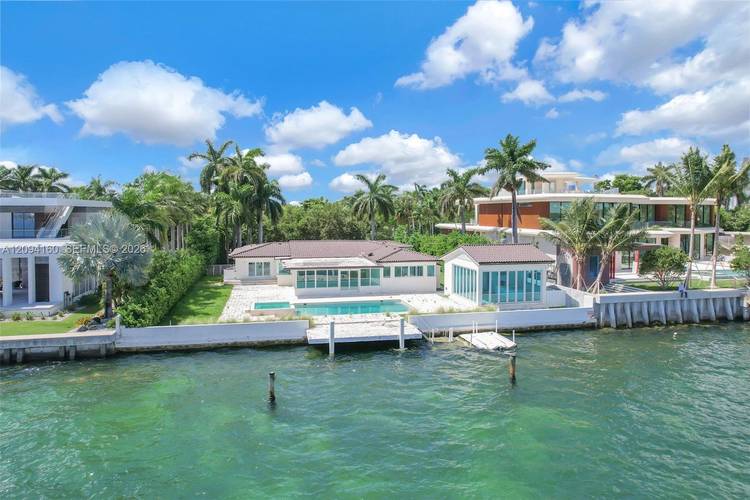A rare waterfront rental opportunity within the gated enclave of Hibiscus Island.