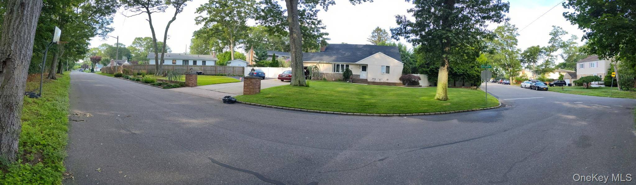 Updated expanded Cape cod on corner lot in beautiful Belmont Lake area of West Babylon.