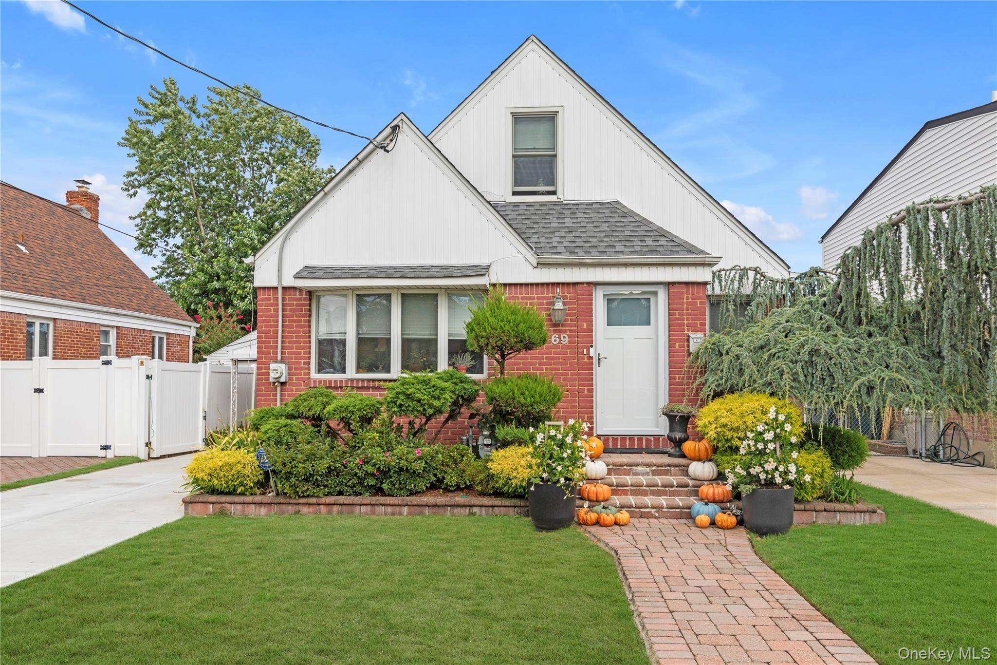 This charming brick Cape Cod in desirable School District 13 offers fantastic curb appeal and is truly move in ready.