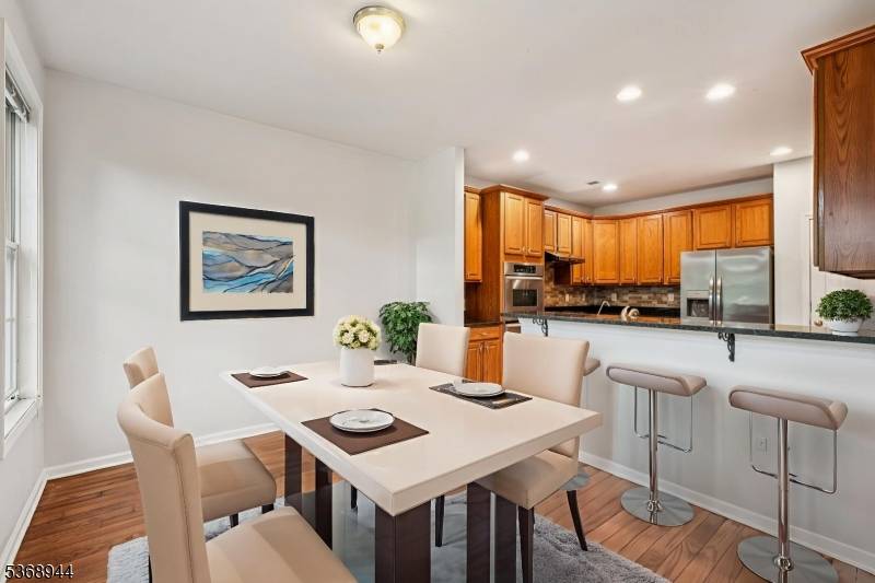 Experience refined living in this spacious Syracuse model the largest floor plan in the coveted luxury community, The Forges at Denville.