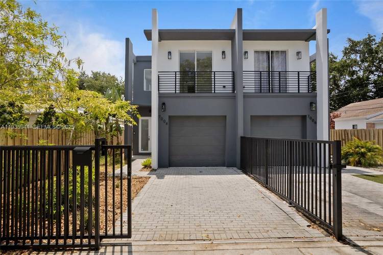 This stunning two story townhouse, nestled in the Northeast area towards Miami Shores, exudes modern elegance and charm.